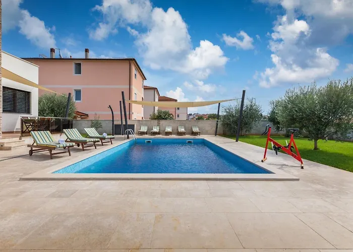Attic With Balcony In Villa Medulin
